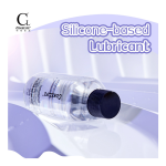 Silicone-based lubricant bottle lying on its side